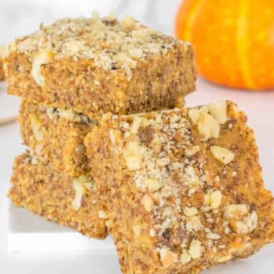 a front view of pumpkin bars leaning on its stack.