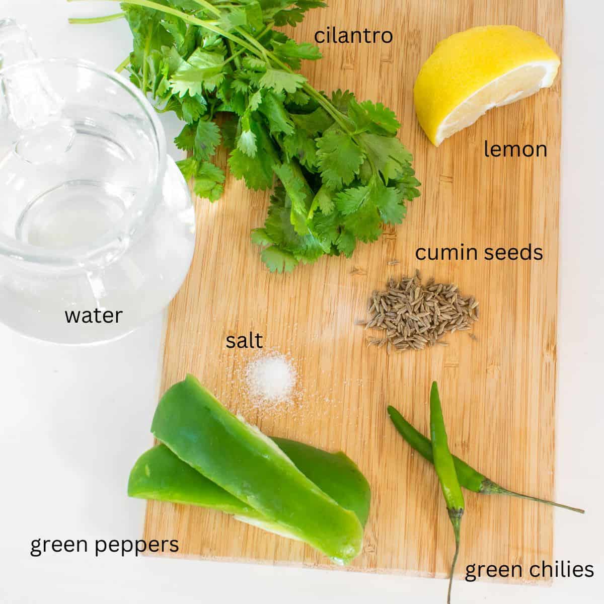 top view of all the ingredients on a wooden board. 