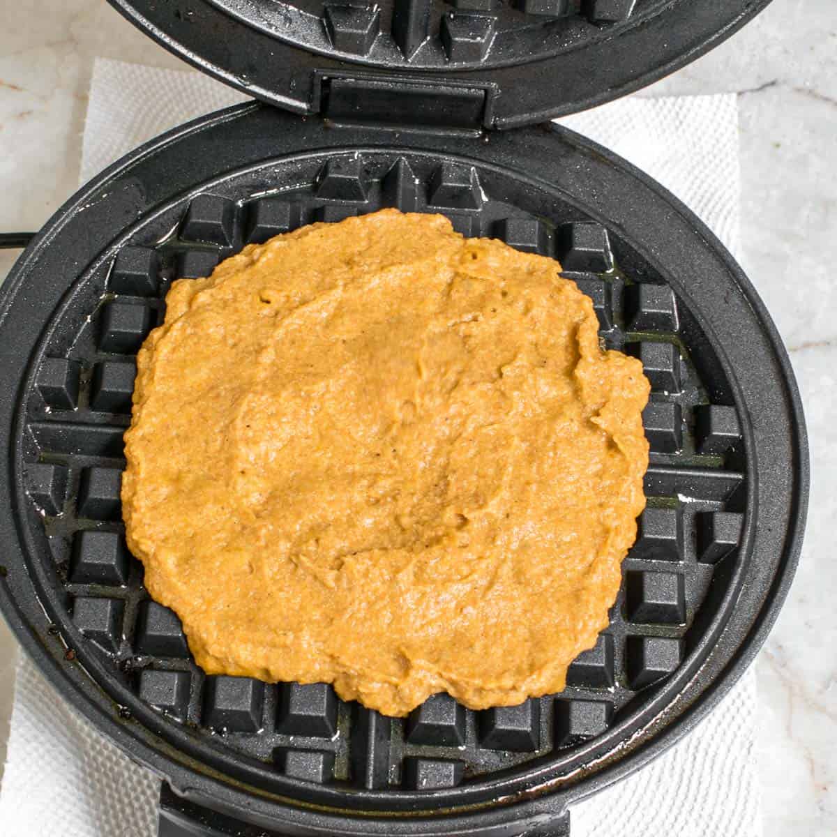 shaped batter in the waffle maker.