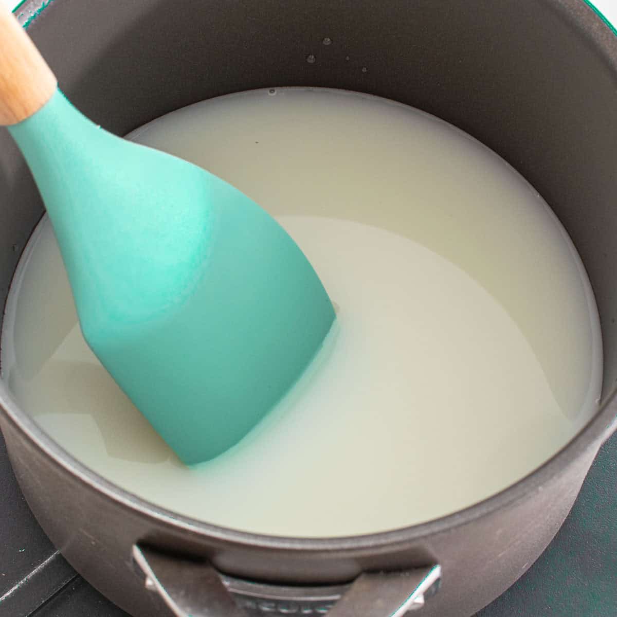 water and milk in the saucepan.