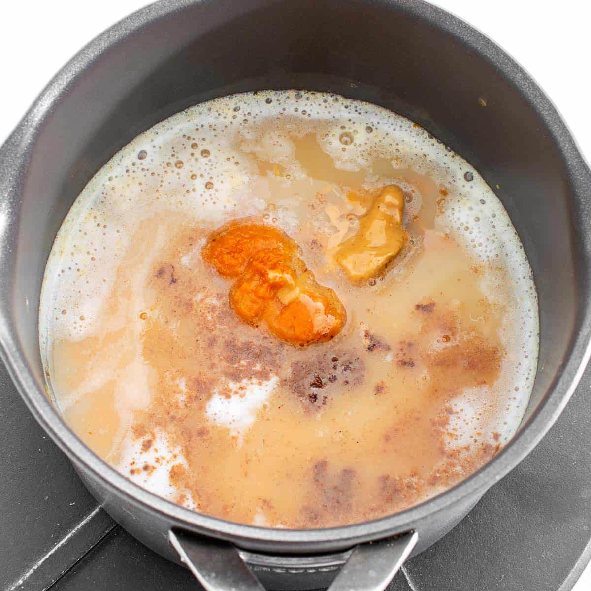puree and spice with peanut butter in the saucepan.