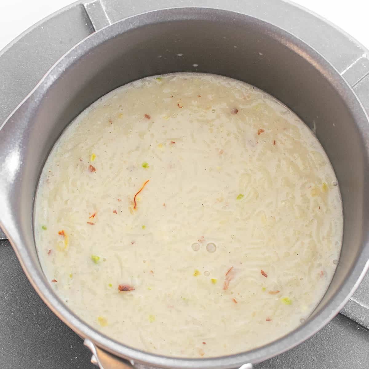 top view of the cooked kheer pudding in the saucepan.