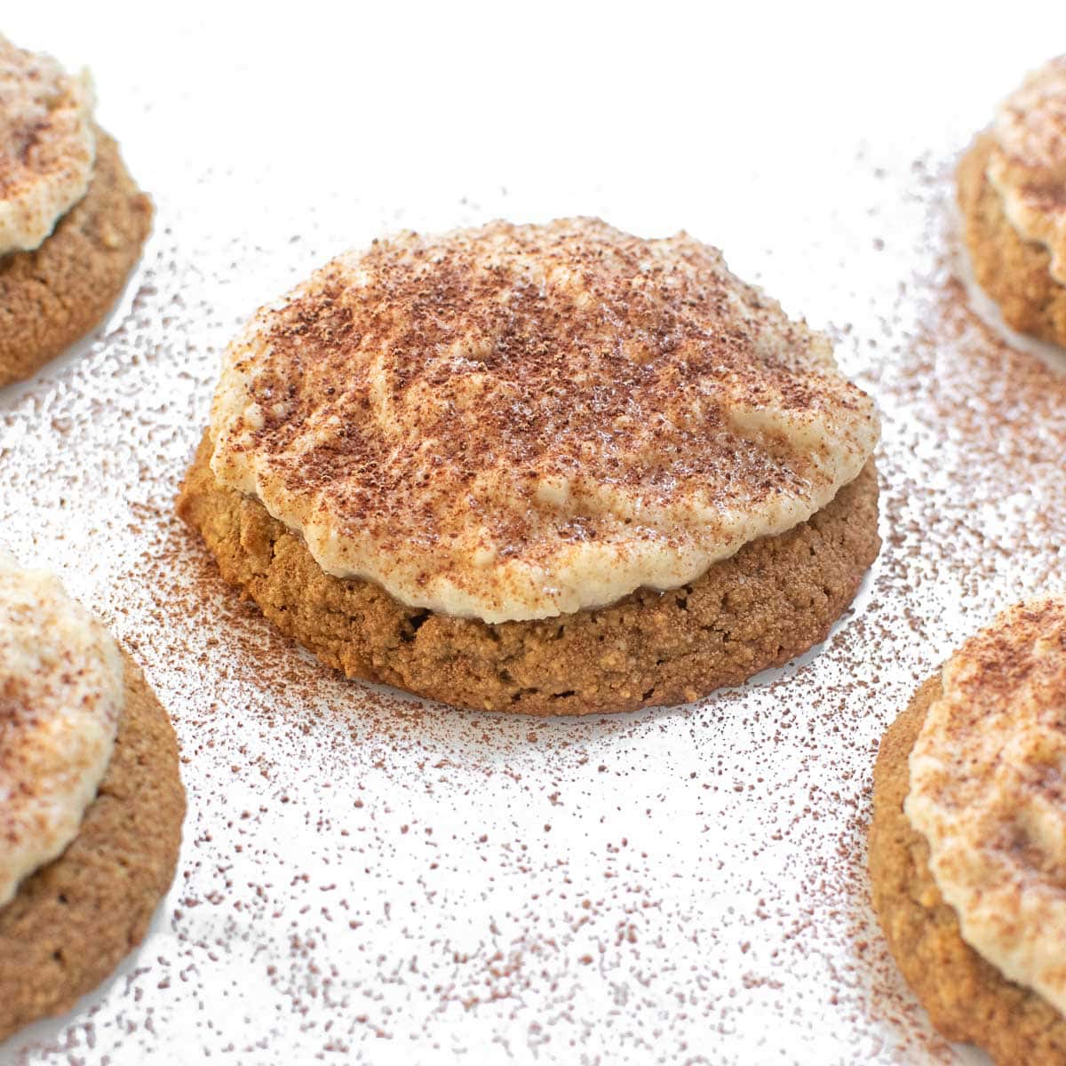 a front close up view of cocoa powder dusted on each of them.