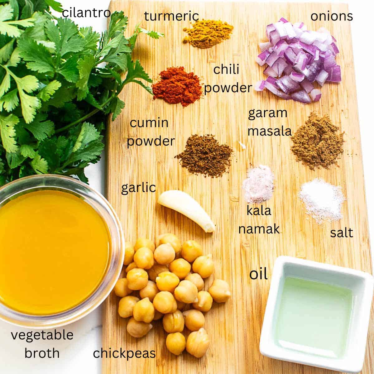 all the raw ingredients on a wooden board.