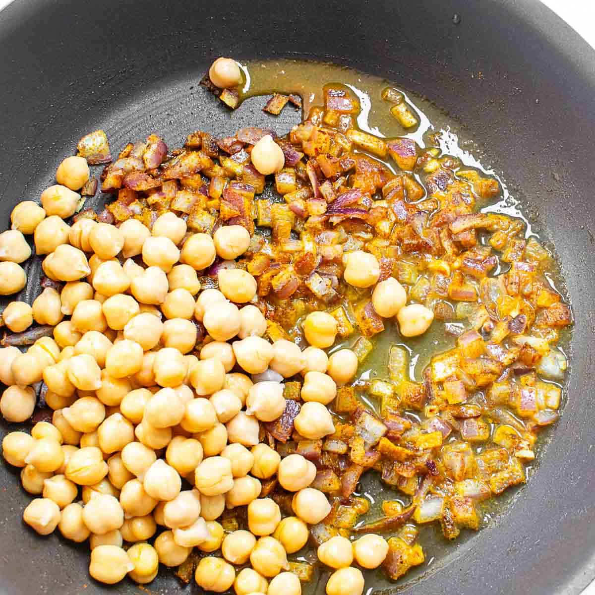 vegetable broth and chickpeas in the same pan added.