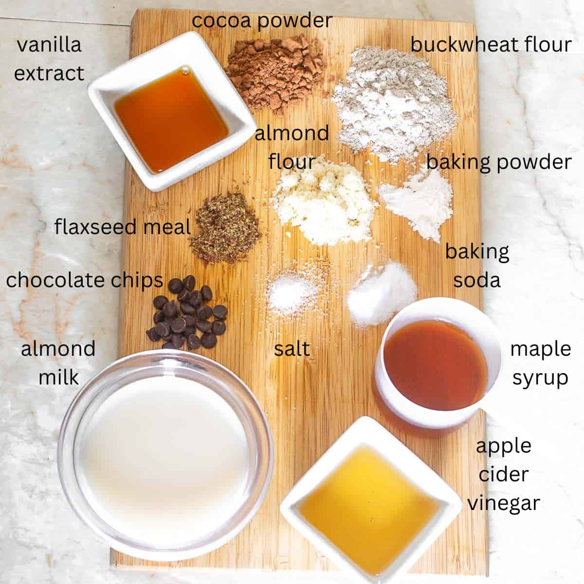 all the raw ingredients on a wooden board.