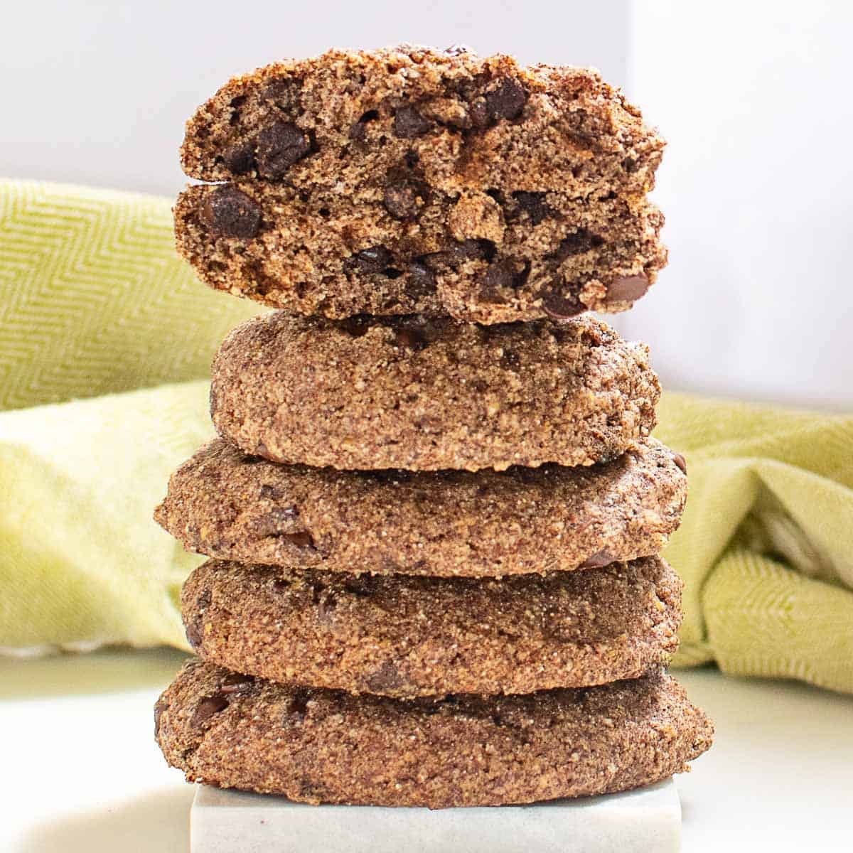 two halves of ragi cookies on top of its stack.