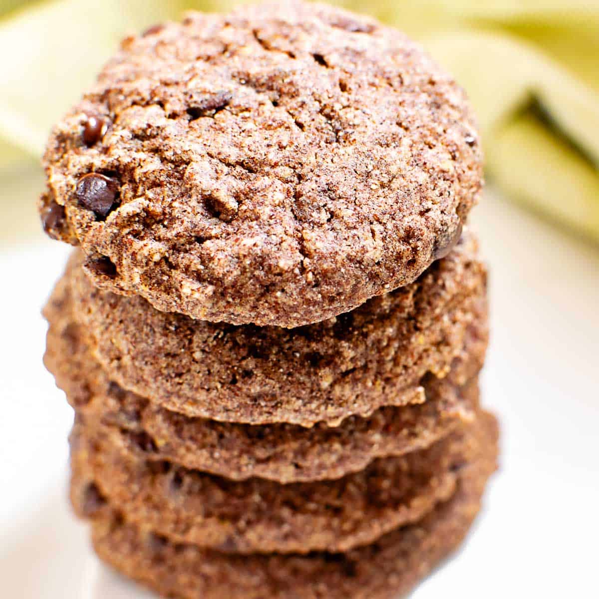 a close 45 degree angle view of stacked ragi cookies.