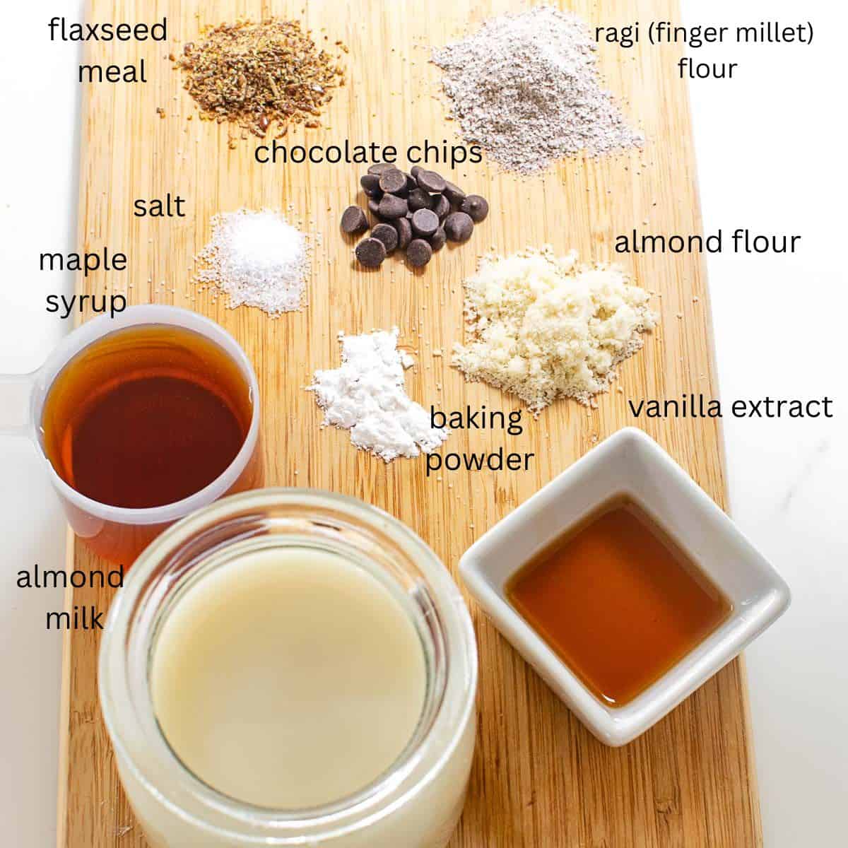 top view of raw ingredients on a wooden board.