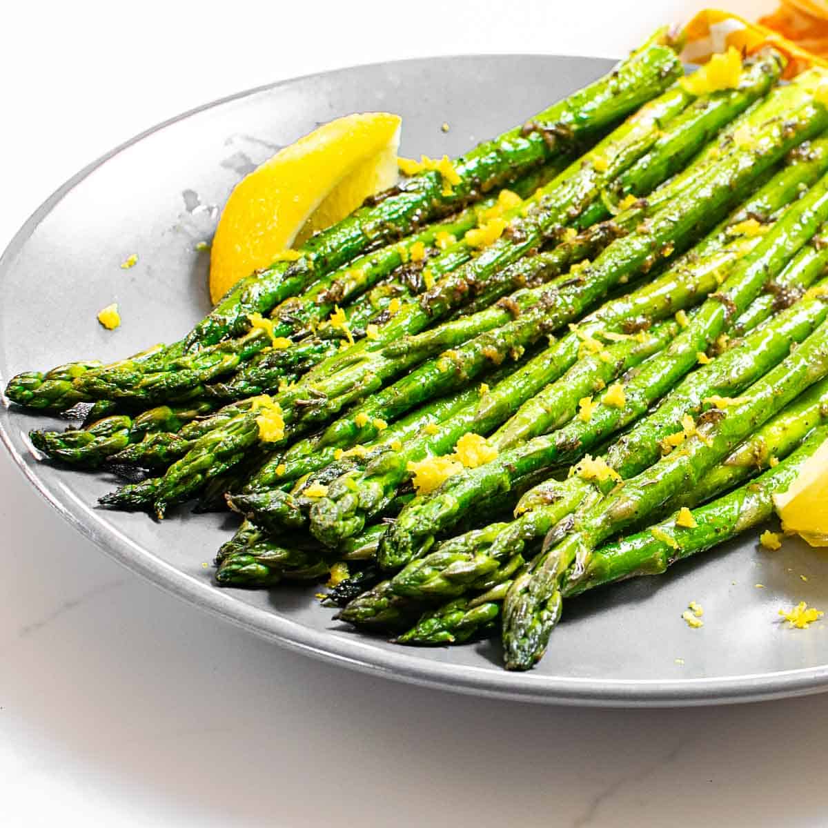 a close up view of served pan fried asparagus.
