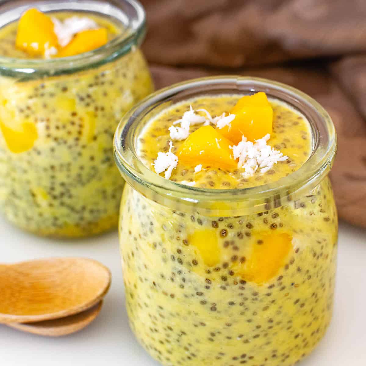 a 45 degree angle view of served mango chia pudding.