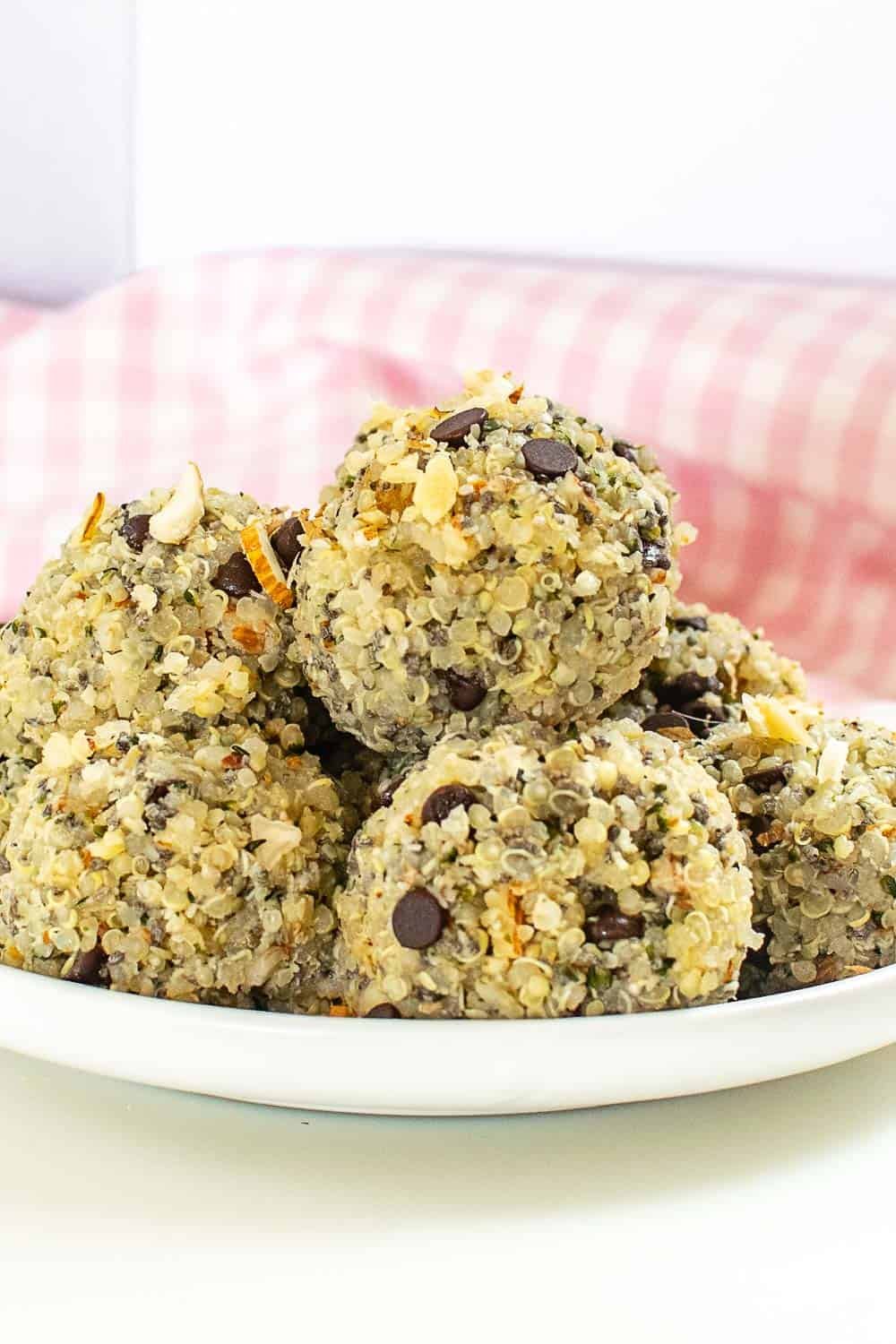 A front view of stacked quinoa energy balls.