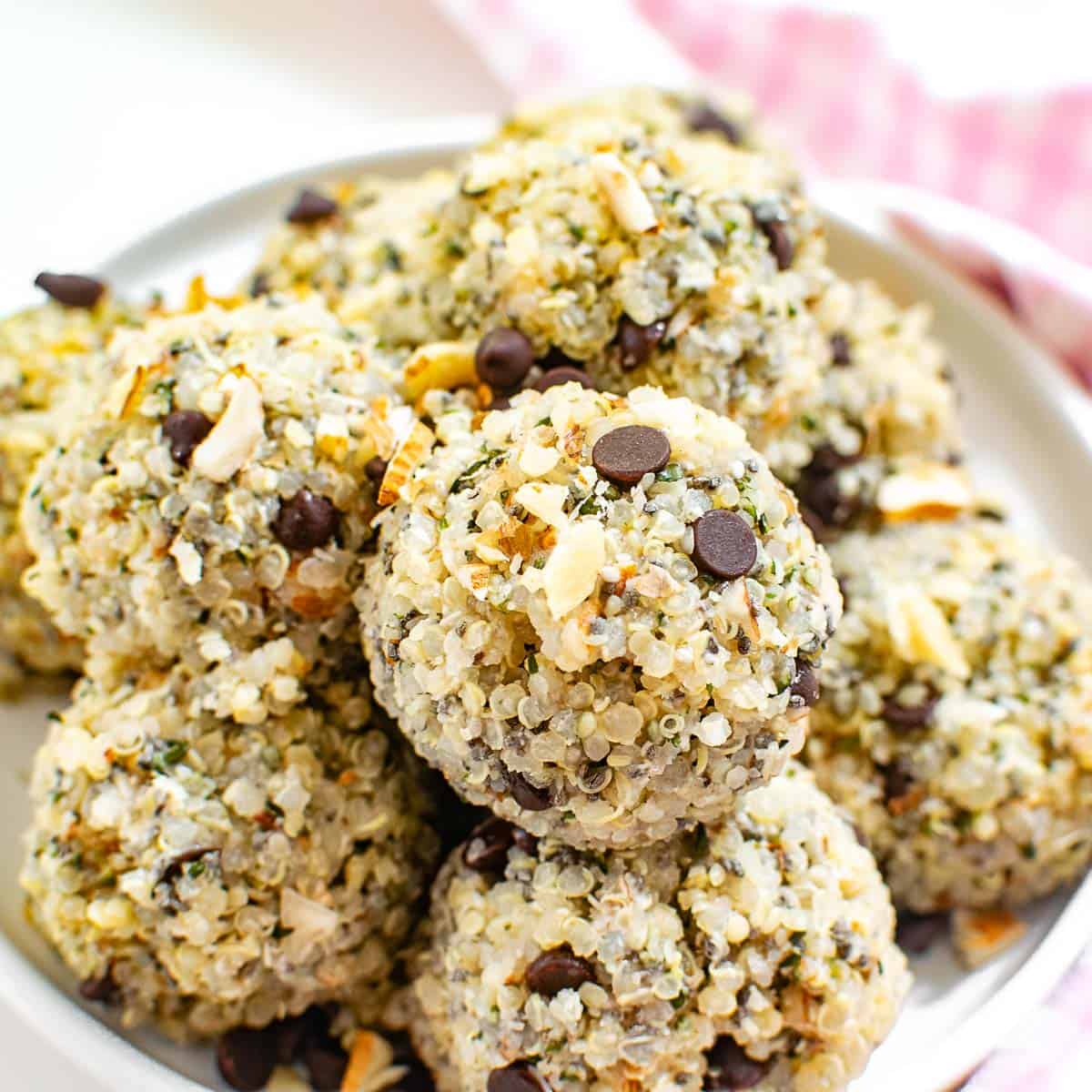 A close up view of the stacked quinoa energy balls.